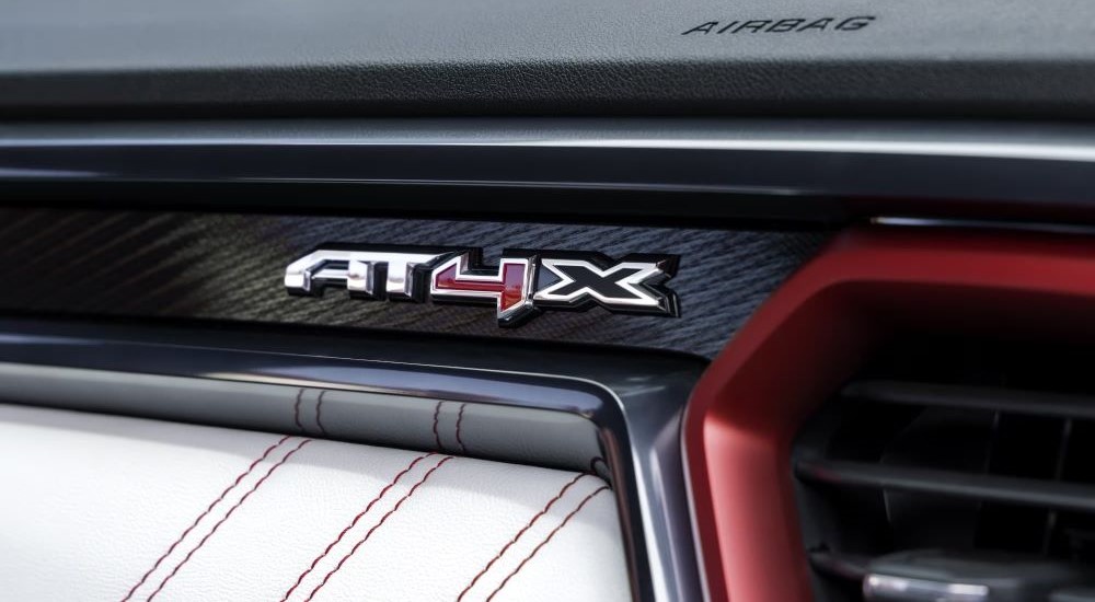Close-up on the badging of a 2025 GMC Canyon AT4X for sale.