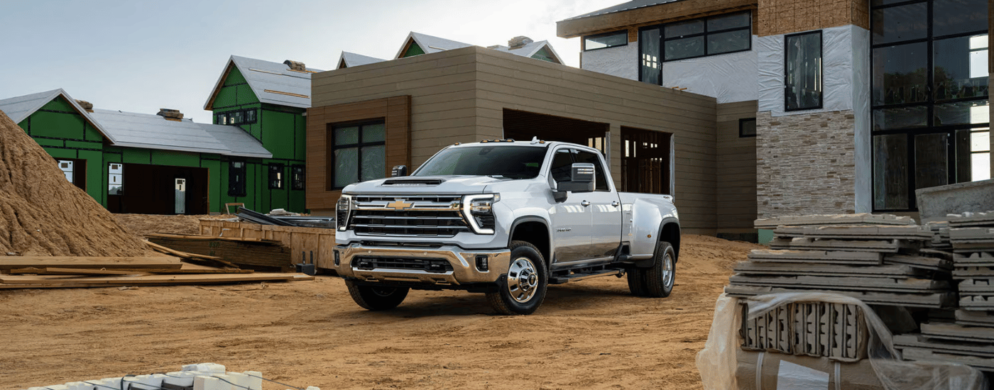White 2026 Chevy Silverado 3500 HD parked on a jobsite