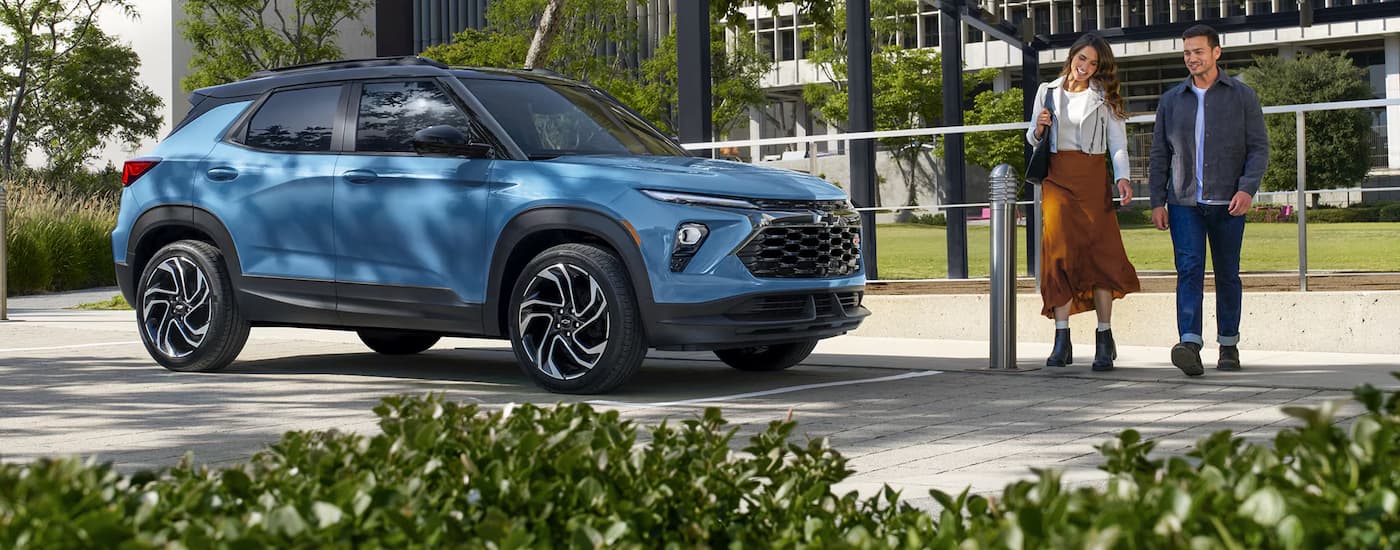 Blue 2026 Chevy Trailblazer parked near a park.