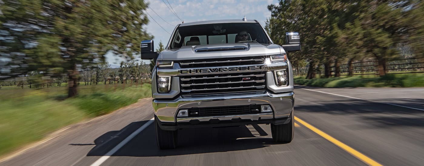 A silver 2020 Chevy Silverado 2500 HD Z71 shown driving from front.