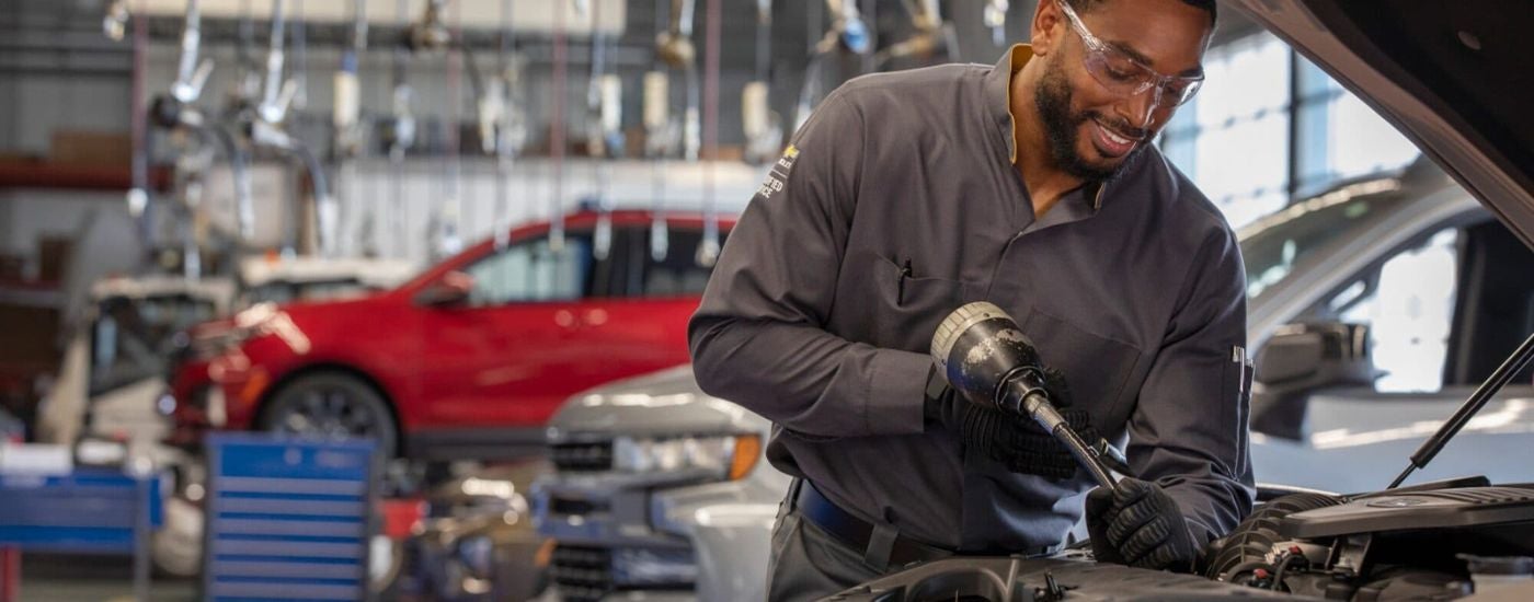 Technician working on a vehicle